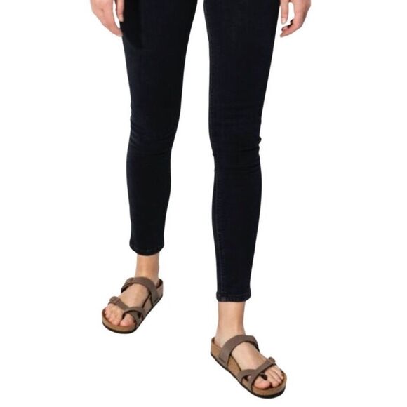 The Birkenstock Mayari sandal features a toe loop and synthetic Birko-Flor upper